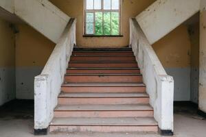 Abandoned Staircase in a Historic Building A Glimpse into the Past photo