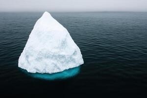 Majestic Iceberg in the Vast Ocean A Frozen Wonder of Nature photo