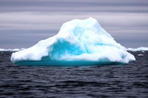 Majestic Iceberg Afloat in the Vast Ocean A Stunning Display of Nature's Frozen Beauty photo