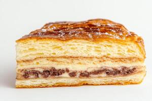 A Delectable Slice of Chocolate Cream Pastry photo