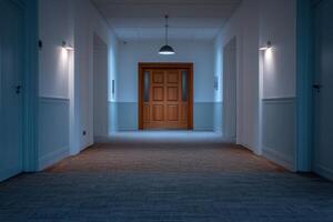 Empty Corridor with Wooden Door A Tranquil Interior Space photo