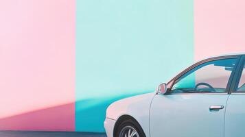 White car parked by colorful wall in urban area photo
