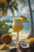 Tropical drink on the beach with coconut. A refreshing tropical drink sits on a table nearby a beach, surrounded by coconuts and pineapples on a sunny day. photo
