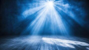Illuminated Stage Dramatic Spotlight and Smoke Fill a Blue-Toned Scene of Light and Shadow photo