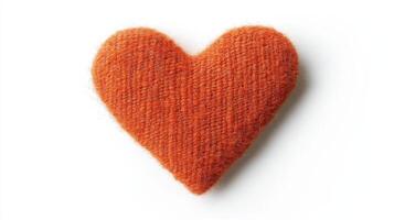 Orange Knit Heart A Symbol of Warmth Love Against a Clean White Background photo