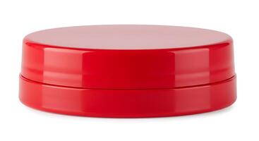 A red container with a lid on a white background photo