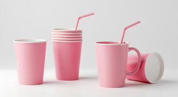 Pink cups with straws and lids on a white surface photo