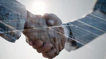 Two business people shaking hands over a digital image photo