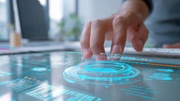 A person is using a touch screen on a computer photo