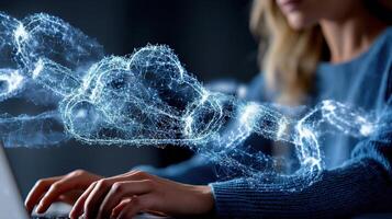 A woman is typing on a laptop with a cloud in the background photo