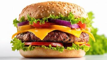 A hamburger with cheese, lettuce and tomatoes photo