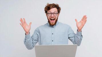 A man with glasses and a laptop is making a face photo