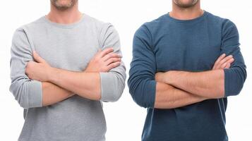 Two men with their arms crossed standing next to each other photo