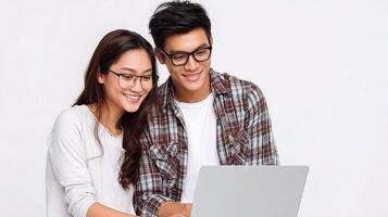 Asian couple using laptop photo