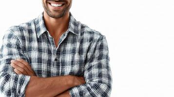 A man in a plaid shirt smiling photo