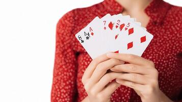 A woman holding four cards in her hands photo