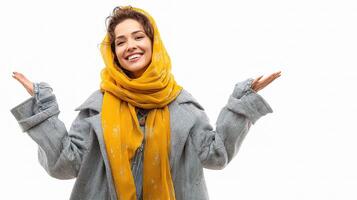 A woman in a yellow scarf is holding her hands up photo