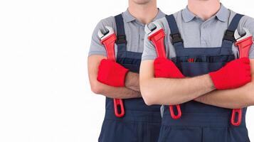 Two men in overalls holding wrens photo