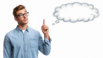 Young man pointing to thought bubble with finger isolated on white background photo