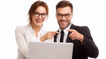 A man and woman in business attire are pointing at a laptop photo
