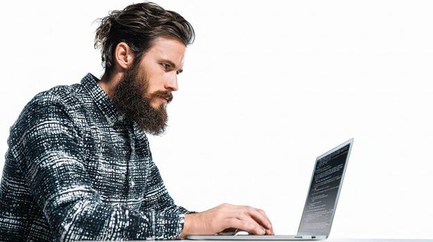 un hombre con un barba y un ordenador portátil foto