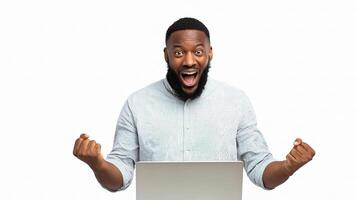 A man with a beard and a laptop is excited photo