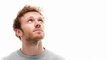A man is looking up at something photo
