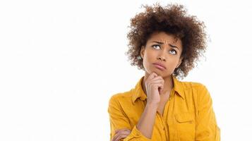 A woman with an afro is thinking photo