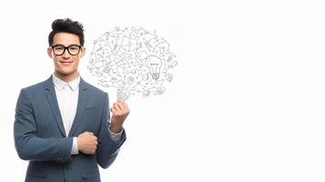 A man in a suit and glasses is holding a light bulb photo