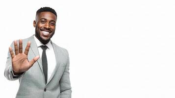 A man in a suit waving his hand photo