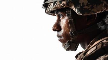 A soldier in uniform with his head turned to the side photo