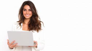 A woman in a white blazer holding a laptop photo
