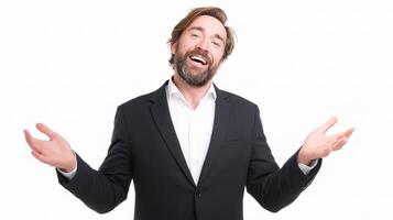 A man in a suit is laughing and holding his hands out photo
