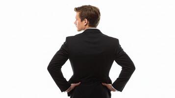A man in a suit is standing with his hands on his hips photo