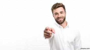 A man is pointing at the camera with his finger photo