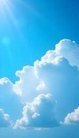 Clouds and sun in blue sky photo