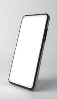 A white tablet with a blank screen on it photo