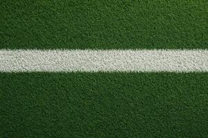 closeup top view of soccer field marking on artificial turf photo