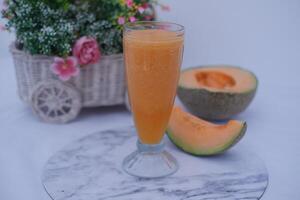 Refreshing Cantaloupe Juice in a Glass photo