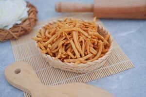 Crispy Fried Snacks in a Wicker Basket photo