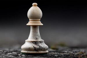 Chess piece stands prominently on a textured surface in soft natural light photo