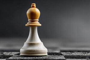 Chess piece stands alone on a dark board, symbolizing strategy and contemplation in the game photo