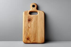 Elegant wooden cutting board positioned on a smooth kitchen surface photo