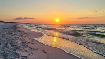 Nice and Breathtaking sunset over a tranquil beach photo