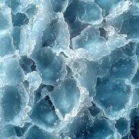 An abstract image displaying the intricate details of ice-like or mineral structures in cool tones. photo