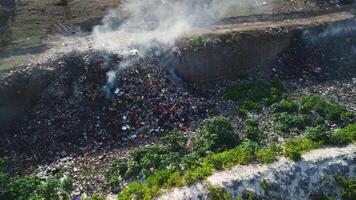 Burning dump, pollution problem, industry drone view in Bali. video