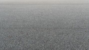 Shallow focus view of asphalt road surface. For background and textured. photo