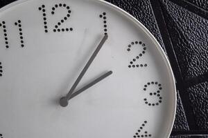 Focus time in clock of two o'clock for design in your business concept isolated on black background, photo