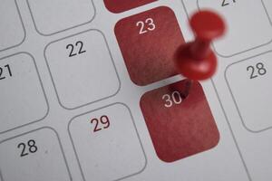 30th day of the month. writing text on calendar date. Save the date. Day of the year concept. photo