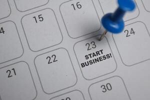 23th day of the month. writing text Start business on calendar date. Save the date. Day of the year concept. photo